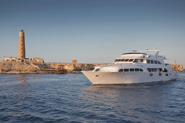 Divers on a liveaboard in Egypt’s Red Sea preparing to explore the North and South dive routes.